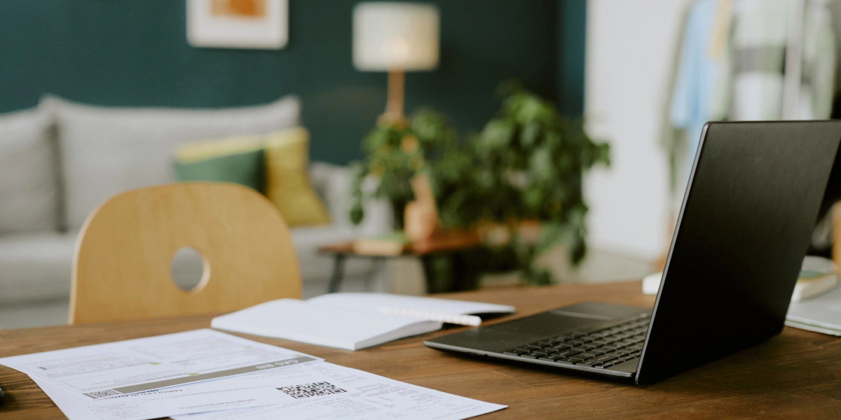 Laptop and paperwork on a desk, used when dealing with probate and estate administration. Laptop and paperwork on a desk, used when dealing with probate and estate administration.